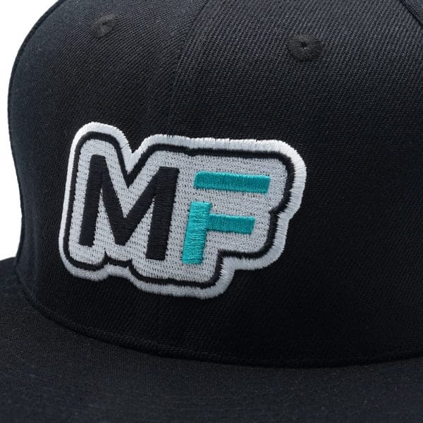 The MF logo on a black hat, representing a stylish and trendy accessory.